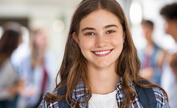 teenage girl with a beautiful, straight smile