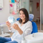 woman smiling after juvederm at the dentist